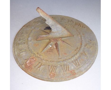 A cast brass/bronze verdigrised sundial with vertical gnomon (24.5cm diameter)