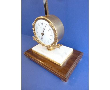 A gravity timepiece 'rise &amp; fall' clock by Thwaites &amp; Reed Ltd, Clerkenwell, London, limited edition no. 127/500, mad