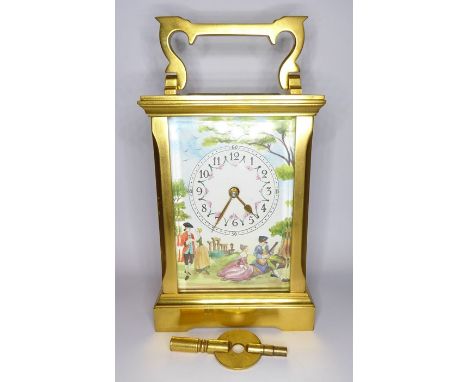 A fine and modern gilt-metal Halcyon Days carriage clock timepiece in the 19th century style (20th century); the swing-handle