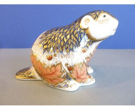 A Royal Crown Derby limited edition paperweight , 'Riverbank Beaver' (gold button)Condition - a little dirty although the gil