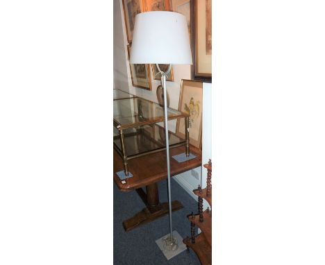 An Italian iGuzzini luminary diapason standard lamp with original shade