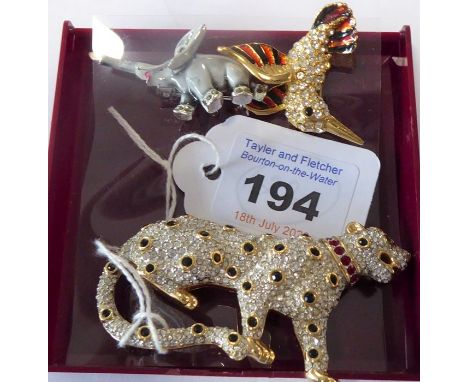 Three enamelled and stone-set brooches(The cost of UK postage via Royal Mail Special Delivery for this lot will be £15 inc.VA