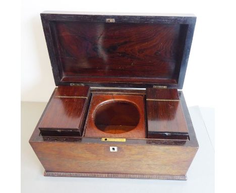 An early 19th century two-division rosewood tea caddy (minus mixing bowl)