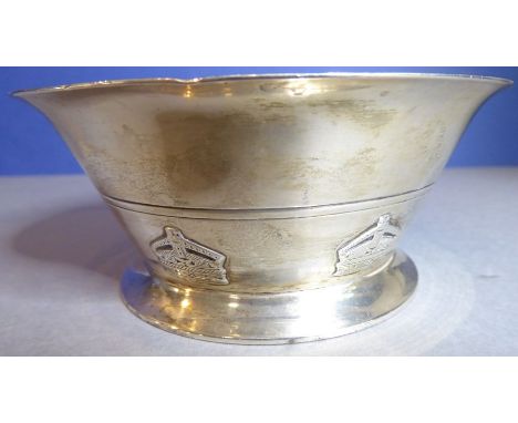 A heavy hallmarked silver sugar bowl of conical section, the base decorated with crowns in relief above a slightly spreading 
