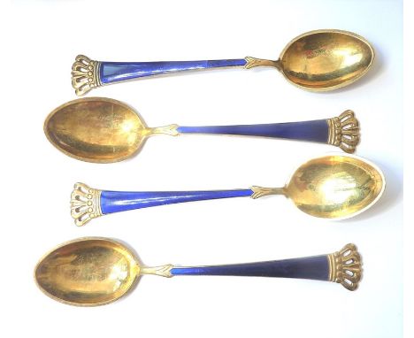 A set of four silver-gilt and enamel Danish egg spoons(The cost of UK postage via Royal Mail Special Delivery for this lot wi