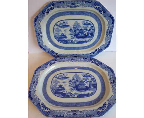 A rare pair of 19th century octagonal Spode ceramic meat platters; transfer-decorated in the Willow-pattern style and with bl