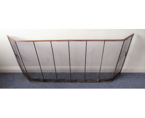 A large late 19th century wire-mesh fireguard having a copper top (165cm wide)