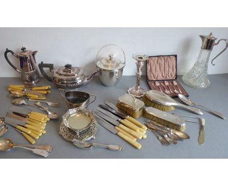 An interesting selection of mostly early 20th century silver plate to include flatware and cutlery, hot-water jug, teapot, tw