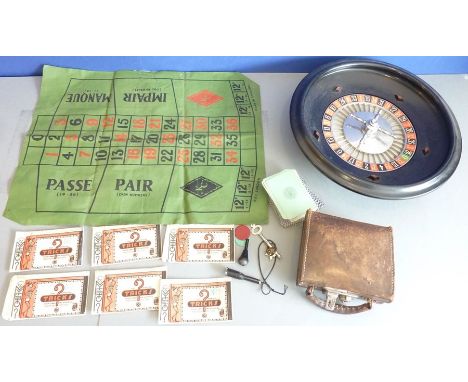 A small hand-stitched brown-leather case containing a variety of interesting tricks, magic and playing card illusions togethe