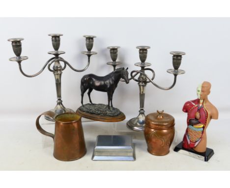 A pair of candelabra, a bronzed equine figure (21 cm height), anatomical model, British Aluminium Company playing card box an