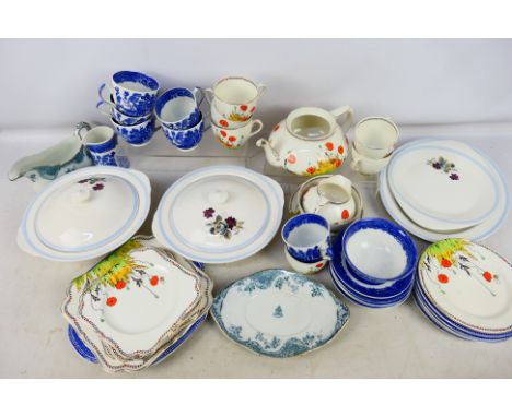 Lot to include a quantity of Crown Ducal tea wares in the Poppy pattern, Wedgwood blue and white coffee wares and a small qua