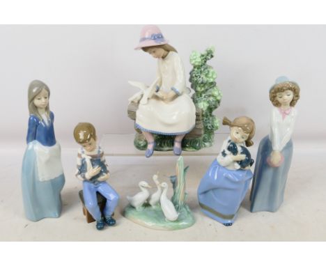 A collection of Nao figures / groups to include a goose group, children with animals, girl with two doves and similar, larges