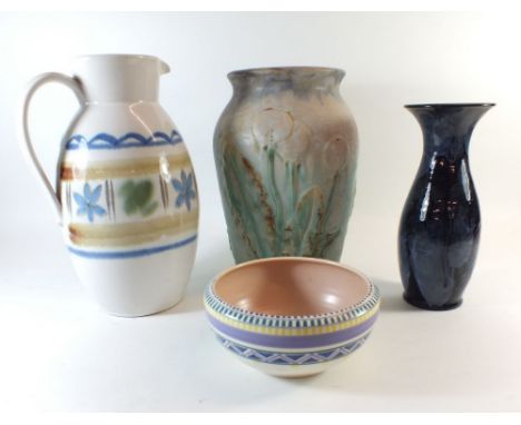 A group of stoneware pottery including a large Bourne Denby 'Danesby' vase, a Buchan jug, an Evenny pottery vase and a Poole 