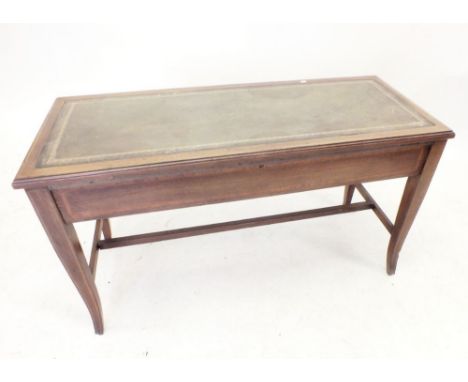 An Edwardian mahogany piano stool converted to a coffee table