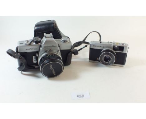 A Minolta SRT 101 camera together with an Olympus Trip 35mm camera