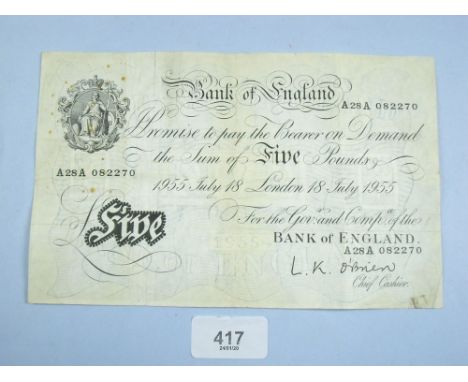 A white Bank of England £5 note, prefix: A28A serial no: 082270, cashier L K O'Brien 1955 - 62.  Some folding and slight foxi