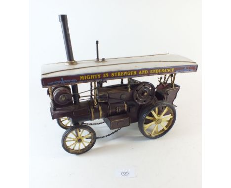 A model of a steam engine labelled 'Mighty in Strength and Endurance'