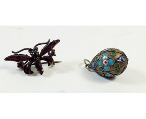 A garnet set insect brooch and a miniature Russian enamel egg