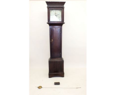 An 18th century oak longcase clock with floral painted face and 30 hour striking movement with date niche