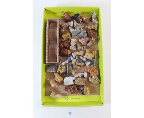 A quantity of Wade Whimsies and bridge form trough