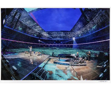 A signed Ralph Larmann Photograph of Ed Sheeran and Sir Elton John Performing Together at Wembley Stadium, 10 July 2015
Uniqu