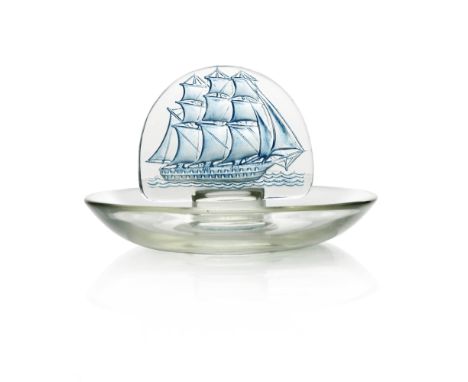 Rene Lalique, a Caravelle glass ashtray or pin dish, model number 312, designed circa 1930, polished and frosted with blue st