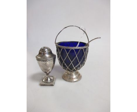 A blue glass lined silver sugar bowl, London 1906, a sifter spoon together with a George III silver pepper  