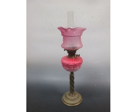 An oil lamp with red glass receiver  