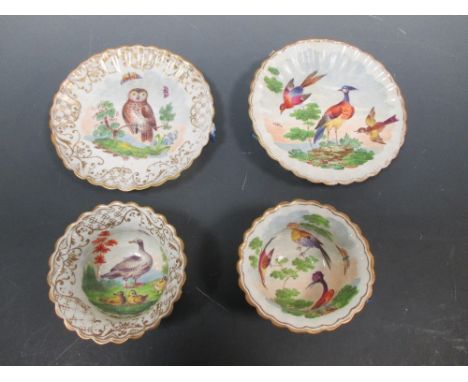 A pair of Meissen rustic cups and saucers, each decorated with birds and sprigs (2)  