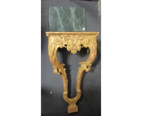 A giltwood and verde marble wall bracket, 81 x 45 x 31cm  