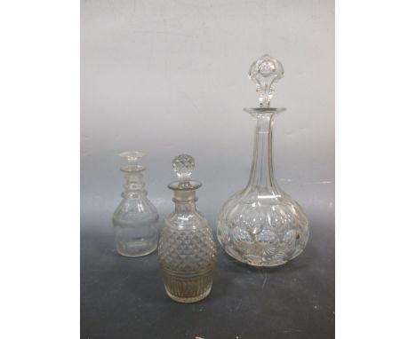 A large 19th century cut glass decanter and two small Regency cut glass decanters (3)  