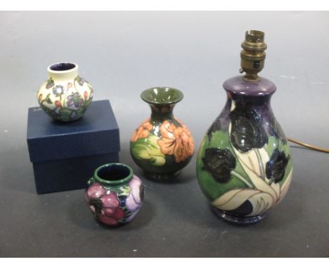 A Moorcroft lamp base and three modern Moorcroft vases (one boxed)  
