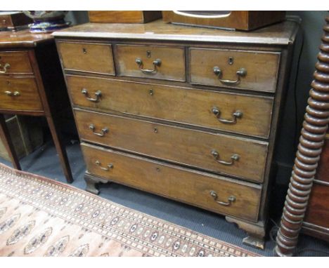 A chest of drawers with three short and three long drawers on ogee bracket feet, 99 x 108 x 53cm  