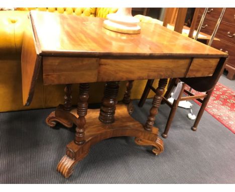 A William IV mahogany sofa table, 130cm wide when open  