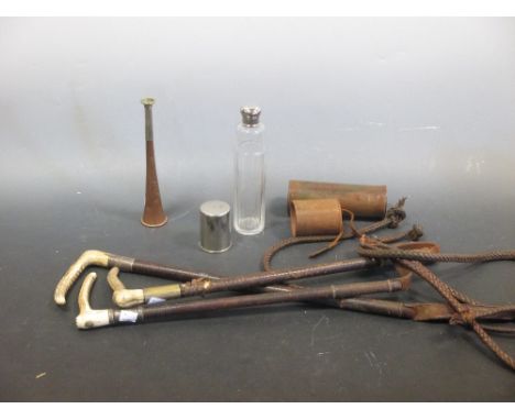 A Hunting Horn, various Hunting crops and a flask  