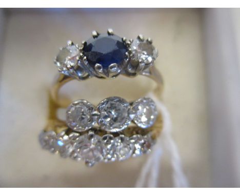 A three stone sapphire and diamond ring, estimated weight of diamonds approx. 0.4cts, indistinctly stamped '18ct Plat', size 