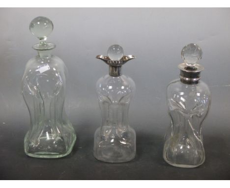 Two silver mounted liqueur decanters and another plain decanter (3)  