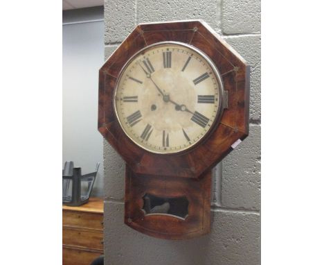An 19th century octagonal mahogany cased wall clock  -No signs of any marks or writing on or inside the clock.