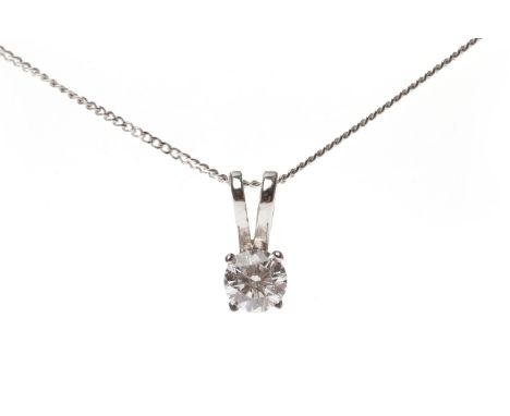 EIGHTEEN CARAT GOLD DIAMOND SINGLE STONE PENDANTwith a four claw set round brilliant cut diamond of approximately 0.22 carats