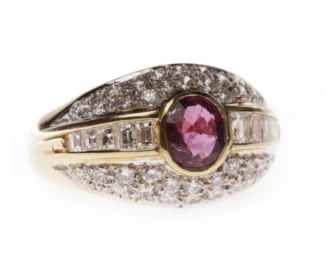 RUBY AND DIAMOND DRESS RINGset with a central oval ruby 5.4x4.4mm flanked by a row of baguette cut diamonds and with round br