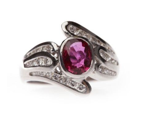RUBY AND DIAMOND DRESS RINGset with a central oval ruby 6.7x5.1mm, on crossover shoulders set with graduated round brilliant 