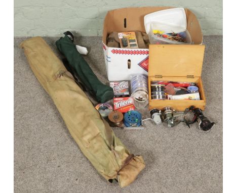 A large box of fishing equipment and accessories, including fishing rod sets, spinning reels (Catcher 30, Ryobi, Angler Scout