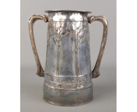 David Veasey for Liberty &amp; Co, a Tudric pewter twin handled vase. For Old Times Sake. Unmarked. Height 19.5cm.