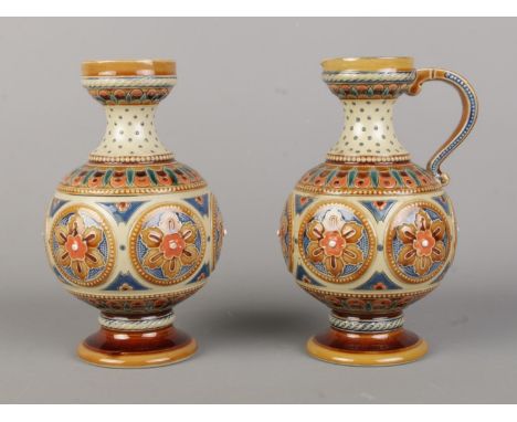 Two Mettlach, Villeroy and Bock bulbous vases, one with handle, pattern 1625. Featuring beaded decoration and central floral 