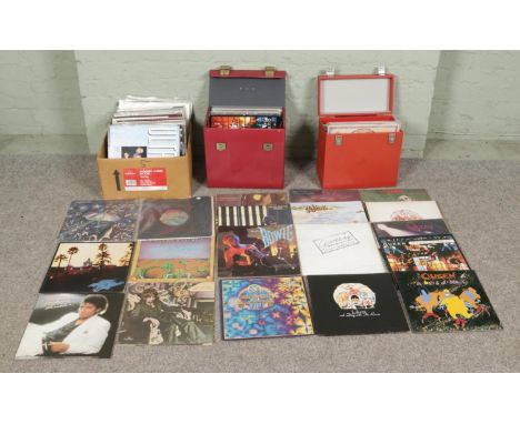 One box and two cases of vinyl LPs records with various genres, including The Eagles, Michael Jackson, Queen, Pink Floyd, Gen