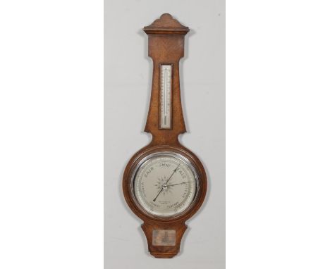 James Lucking &amp; Co. oak banjo barometer. Bearing presentation plaque reading "Presented to Tom Wellings on his retirement