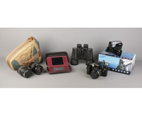 A collection of mainly photographic equipment, to include Canon EOS 1000F camera, with bag and three lenses, Samsung digital 