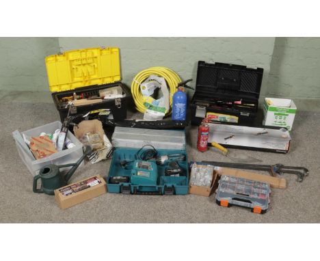 A large quantity of DIY accessories and tools. To include Stanley toolbox and contents, Karcher hosepipe, Magnusson tile cutt
