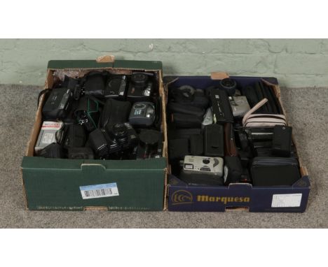 Two boxes of 35mm point and shoot, APS film and disc cameras, including examples from Canon, Olympus, Kodak, Nikon, Minolta, 