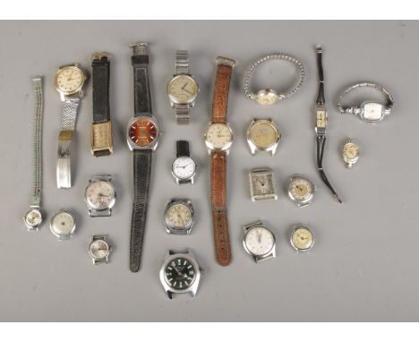 A tray of assorted gents and ladies wristwatches to include Timex, Geneva, Oris, Ingersoll, Provita, etc.